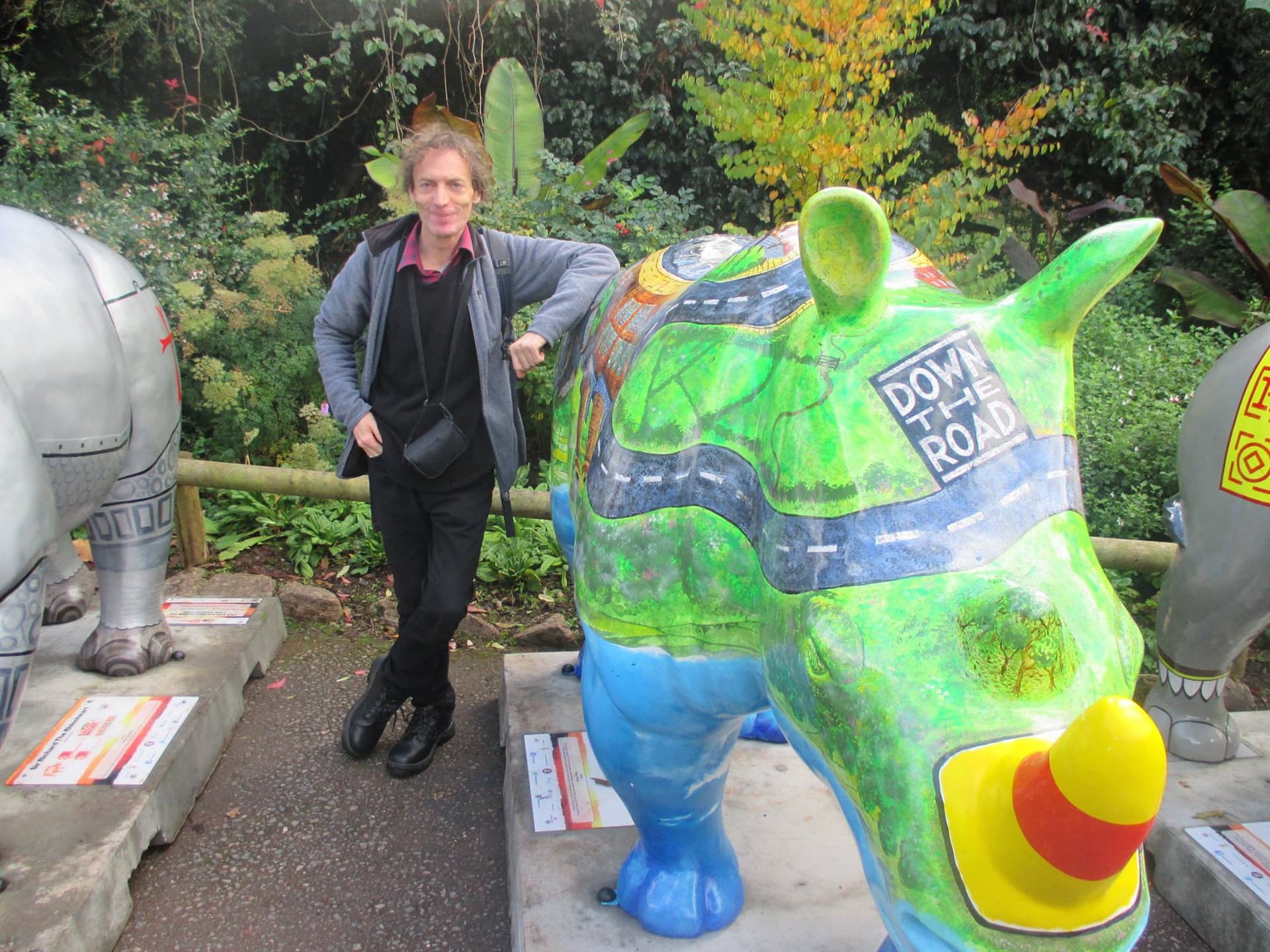 Peter Poole photographed beside one of his rhino trail artworks.