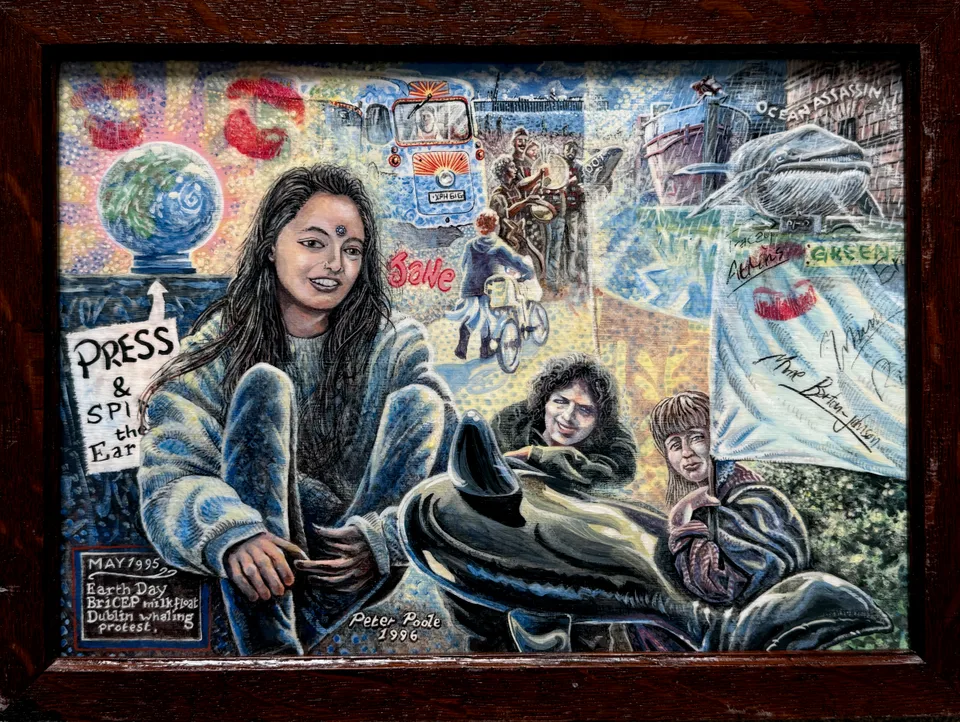 May 1995 by Peter Poole, 1996. An environmental montage-style painting on wood panel based on photographs of green events, in a wooden frame.
